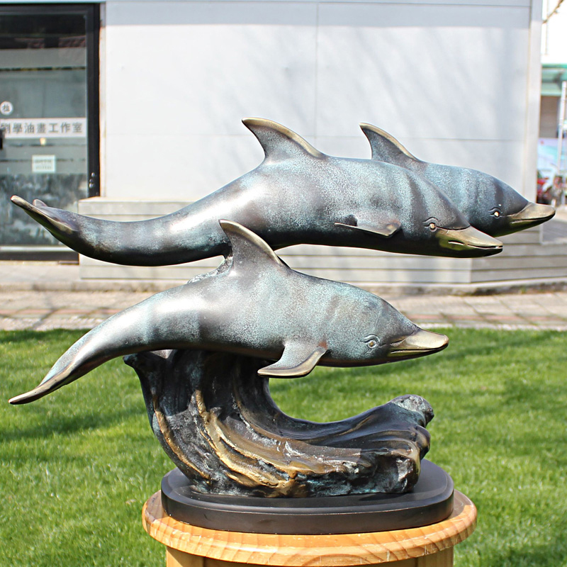 double dolphins bronze statue